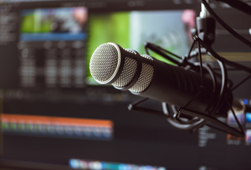 Microphone in front of a computer monitor