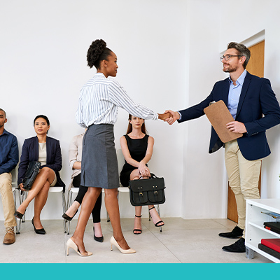 job interview - candidate shaking hands with job recruiter